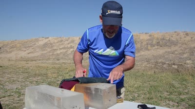 Handguns editor Scott Rupp fires some Federal Punch .380 defensive handgun ammo into ballistics gel the range for a performance test run.